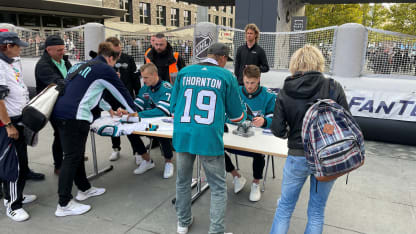 Berlin FanFest signing jerseys