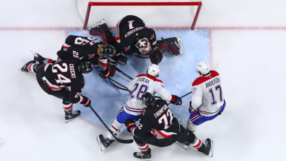 Christian Dvorak #28 of the Montreal Canadiens is defended by Tage Thompson #72, Dylan Cozens #24, Rasmus Dahlin #26 and Ukko-Pekka Luukkonen #1 of the Buffalo Sabres during an NHL game on March 1, 2025 at KeyBank Center in Buffalo, New York. (Photo by Bill Wippert/NHLI via Getty Images)