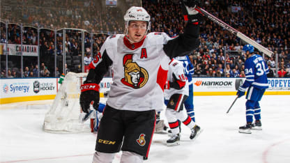 Matt_Duchene_Celebrating_Goal_Hand_Up_Holding_Stick