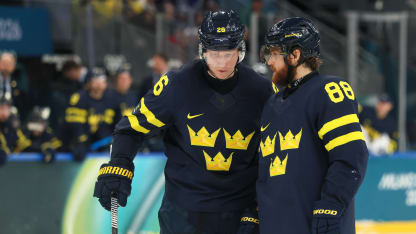 Rasmus Dahlin #26 and William Nylander #88 of Team Sweden talk in the third period during the Men's Preliminary Group B match between Sweden and Slovakia on day eight of the Milano Cortina 2026 Winter Olympic games at Milano Santagiulia Ice Hockey Arena on February 14, 2026 in Milan, Italy. (Photo by Bruce Bennett/Getty Images)