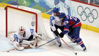 Miikka Kiprusoff #34 of Finland makes a save against Michal Handzus #26 of Slovakia during the ice hockey men's bronze medal game between Finland and Slovakia on day 16 of the Vancouver 2010 Winter Olympics at Canada Hockey Place on February 27, 2010 in Vancouver, Canada. (Photo by Jamie Squire/Getty Images)