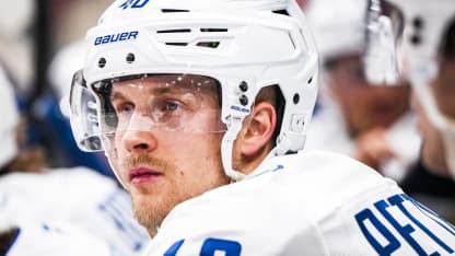 Elias Pettersson #40 of the Vancouver Canucks looks on from the bench during a game against the Carolina Hurricanes during the second period at Lenovo Center on January 10, 2025 in Raleigh, North Carolina. (Photo by Josh Lavallee/NHLI via Getty Images)