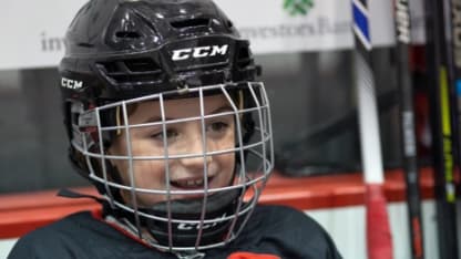 Grace in Hockey Helmet