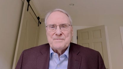 Ken Dryden congratulates Lane Hutson