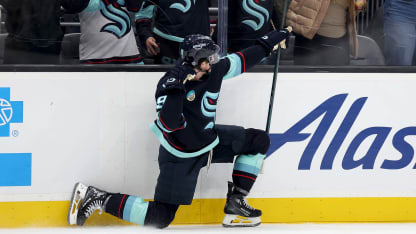 Jared McCann #19 of the Seattle Kraken celebrates his game-winning goal in overtime against Adin Hill #33 of the Vegas Golden Knights at Climate Pledge Arena on November 08, 2024 in Seattle, Washington. (Photo by Steph Chambers/Getty Images)