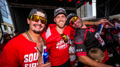 Seth Jarvis #24, Nikolaj Ehlers #27, and Jordan Martinook #48 celebrate during the Carolina Hurricanes Stanley Cup Final Victory Parade at Lenovo Center on June 20, 2026 in Raleigh, North Carolina. (Photo by Josh Lavallee/NHLI via Getty Images)