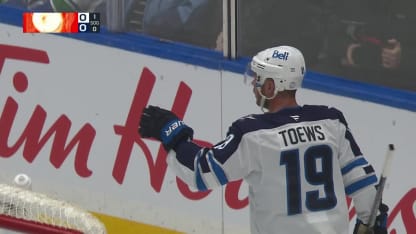 Toews tips in opener