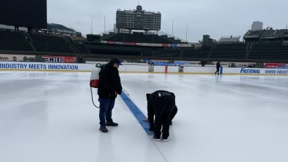 Wrigley Field blue line getting painted