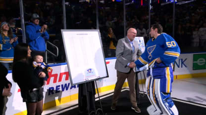 Blues celebrate Binnington's milestone