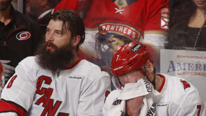 Brent Burns #8 and Dmitry Orlov #7 of the Carolina Hurricanes sit on the bench in the third period during a break in the action against the Florida Panthers in Game Three of the Eastern Conference Final of the 2025 Stanley Cup Playoffs at the Amerant Bank Arena on May 24, 2025 in Sunrise, Florida. (Photo by Eliot J. Schechter/NHLI via Getty Images)