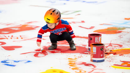 Fan Club members paint the Bell Centre ice