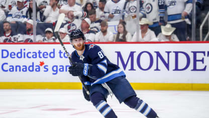 Kyle Connor #81 of the Winnipeg Jets keeps an eye on the play during second period action against the Dallas Stars in Game Five of the Second Round of the 2025 Stanley Cup Playoffs at the Canada Life Centre on May 15, 2025 in Winnipeg, Manitoba, Canada. The Jets shutout the Stars 4-0 and trail the series 3-2. (Photo by Darcy Finley/NHLI via Getty Images)