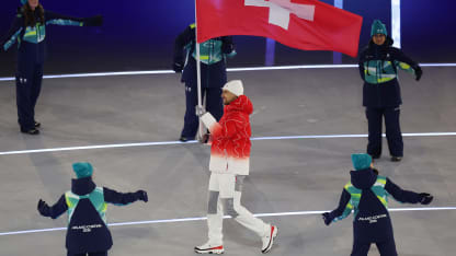 Nino Niederreiter carrying Swiss flag