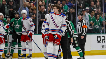 New York Rangers center Matt Rempe (73) gets a game misconduct penalty and leaves the ice during the game between the Dallas Stars and the New York Rangers on December 20, 2024 at American Airlines Center in Dallas, Texas. (Photo by Matthew Pearce/Icon Sportswire via Getty Images)