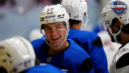 JJ Peterka #77 of the Buffalo Sabres talks with his teammate during practice prior to the 2024 NHL Global Series Czechia on October 02, 2024 in Prague, Czech Republic