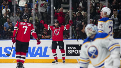 Nico Hischier #13 of the New Jersey Devils celebrates after scoring against the Buffalo Sabres