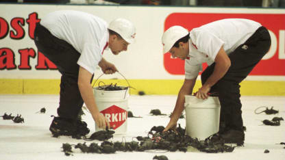Clean-up workers clear the ice of rubber rats in Florida