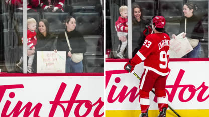 DeBrincat son with sign split