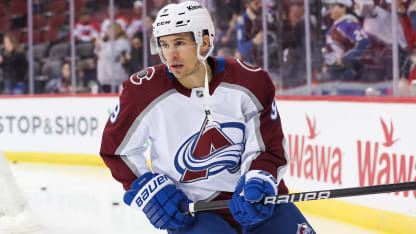 Zach Parise chasing Cup with Avs