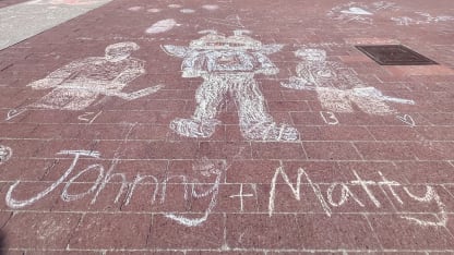 chalk drawing of Gaudreau brothers outside of Nationwide Arena