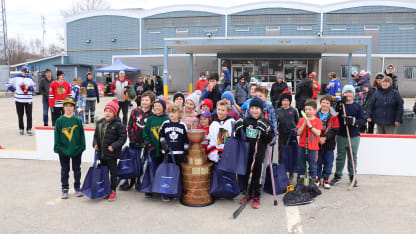 People in a crowd with the copper cup