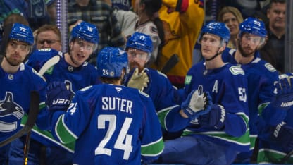 Canucks score twice in eight seconds