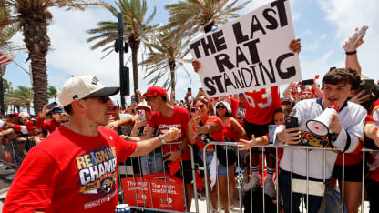 fla-parade-marchand-rat-sign