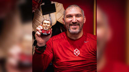 Alex Ovechkin floss holder figurine giveaway for game against Anaheim Ducks