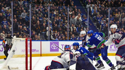 Garland cleans up in front