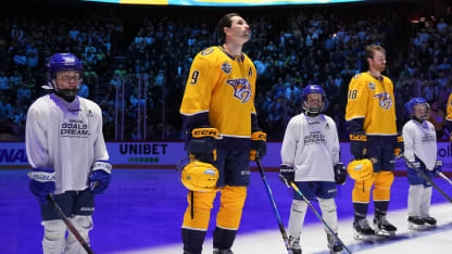 Forsberg with kids GLO 2