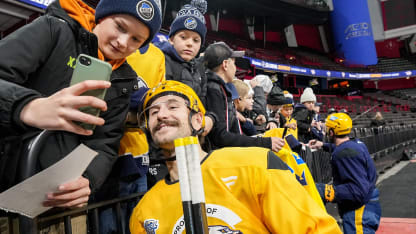 Forsberg with kids GLO 3
