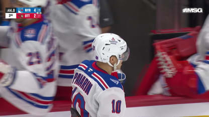 Panarin earns 900th point on empty netter