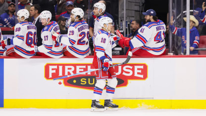 Panarin earns 900th point on empty netter