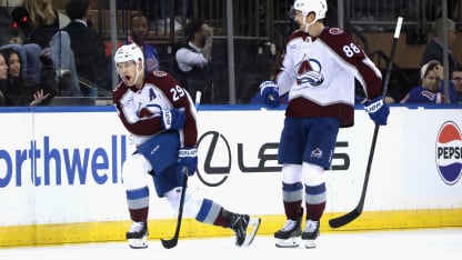 MacKinnon finishes dazzling play to win it in OT
