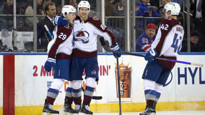 MacKinnon finishes dazzling play to win it in OT