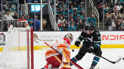 Celebrini spins around to score