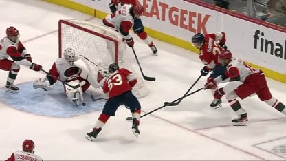 Marchand stuffs it into the net