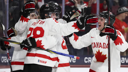 CAN celebrate goal at WJC