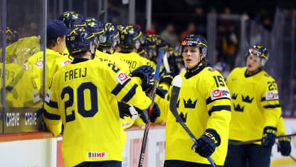 ST PAUL, MINNESOTA - DECEMBER 26: Ivar Stenberg #15 of Sweden celebrates his game-winning goal against Slovakia with teammates in the third period of a group stage game at Grand Casino Arena on December 26, 2025 in St Paul, Minnesota. Sweden defeated Slovakia 3-2.