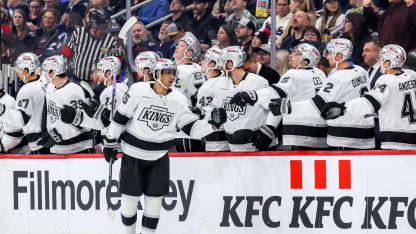 Byfield deflects it in