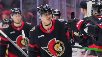 Stutzle roofs it betwreen his own legs