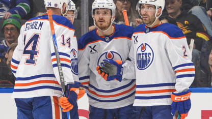 Roslovic slides it in on the backhand