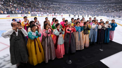 Harmonica group performs national anthem