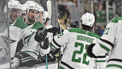 Bourque scores as he falls to his knees