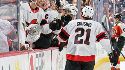 Cousins cleans up out front