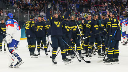 Players of Team Sweden celebrate the team's 5-3 victory in during the Men's Preliminary Group B match between Sweden and Slovakia on day eight of the Milano Cortina 2026 Winter Olympic games at Milano Santagiulia Ice Hockey Arena on February 14, 2026 in Milan, Italy. (Photo by Bruce Bennett/Getty Images)