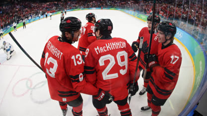 Nathan MacKinnon #29 of Team Canada celebrates with teammates after scoring a goal in the third period during the Men's Semifinals Playoff match between Canada and Finland on day fourteen of the Milano Cortina 2026 Winter Olympic games at Milano Santagiulia Ice Hockey Arena on February 20, 2026 in Milan, Italy. (Photo by Bruce Bennett/Getty Images)