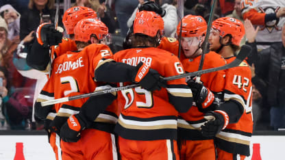 Trouba cuts the lead in half