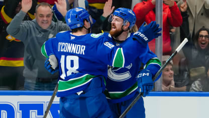 Filip Hronek #17 of the Vancouver Canucks is congratulated after scoring a goal against the Carolina Hurricanes during the first period of their NHL game at Rogers Arena on March 4, 2026 in Vancouver, British Columbia, Canada. (Photo by Derek Cain/Getty Images)