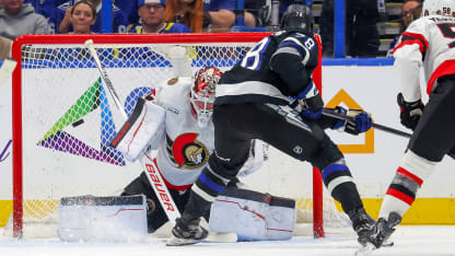 Lilleberg sneaks in backhand shot